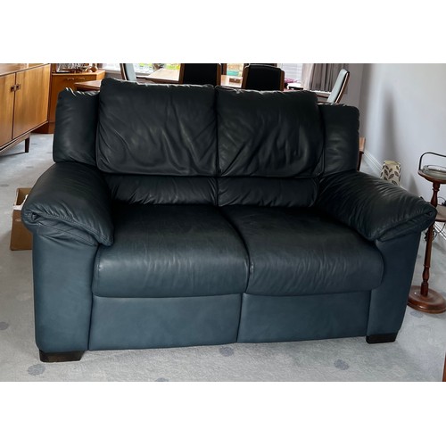 117 - A blue leather 2 seater sofa and 2 swivel/reclining rocking armchairs and footstool by Natuzzi. Foot... 