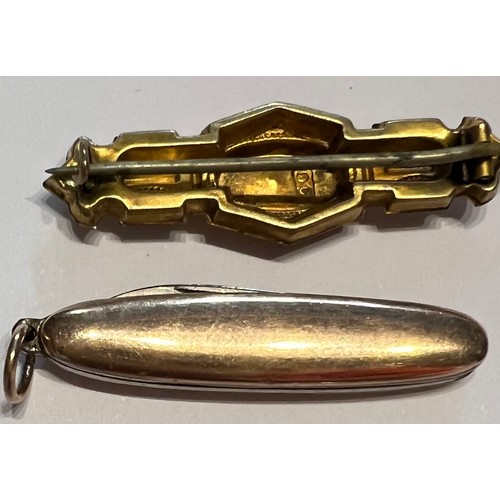 591 - An Edwardian 9 carat gold bar brooch with diamond chip and a 9 carat gold cased miniature penknife l... 