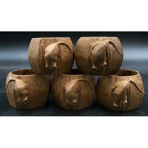 1160 - Five Robert 'Mouseman' Thompson carved octagonal oak napkin rings.