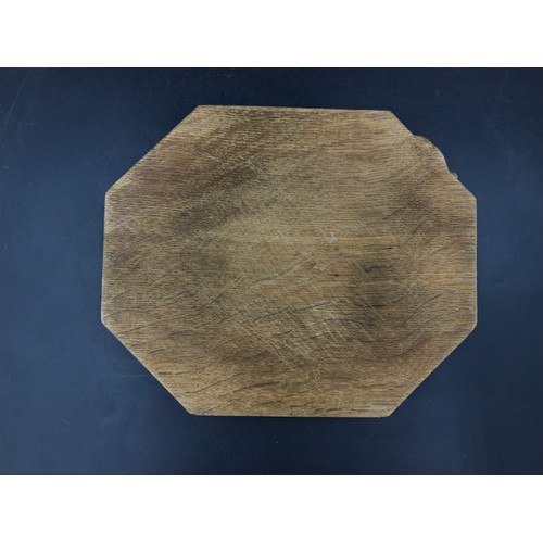 1161 - A Robert 'Mouseman' Thompson octagonal cheeseboard 30.5 x 25cm.