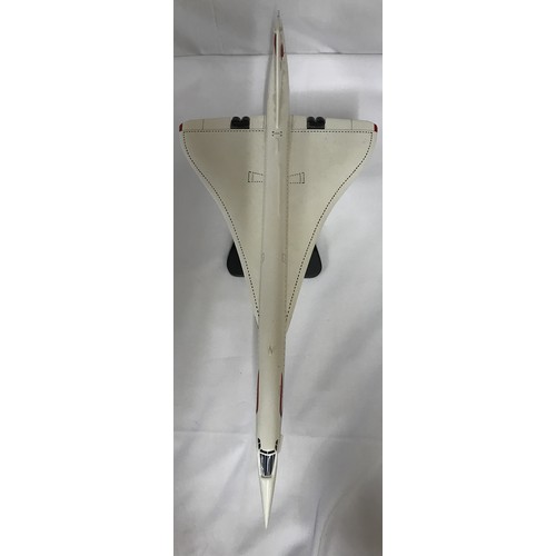 1247 - Display model of Concorde by Bravo Delta Models, 60 x 25cm w on stand with the dates 1969-2003.