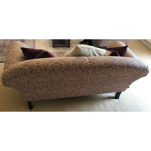 111 - Two sofas and a matching armchair in a light coloured patterned moquette one sofa 223 the other 196 ... 