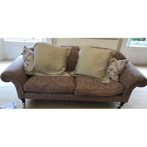 111 - Two sofas and a matching armchair in a light coloured patterned moquette one sofa 223 the other 196 ... 