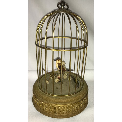 Items to include an automaton bird in a brass cage plated centre