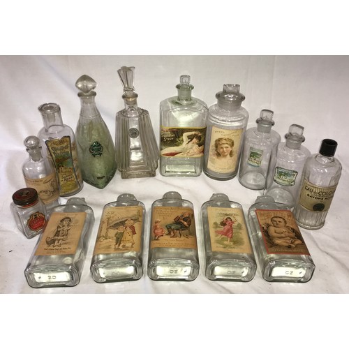 412 - A collection of vintage glass bottles, some old medicine bottles, with labels to include, Humphreys ... 