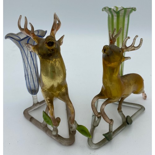 413 - Two early 20thC lampworked glass vases, one in yellow one in green both with applied glass deer, 10.... 