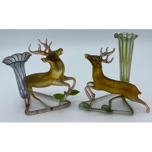 413 - Two early 20thC lampworked glass vases, one in yellow one in green both with applied glass deer, 10.... 