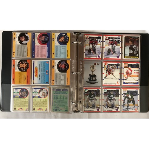 443 - A collection of folders containing mainly American football cards to include a large quantity of foo... 