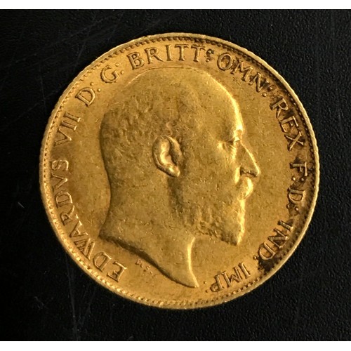 673 - A 1908 1/2 Sovereign coin.