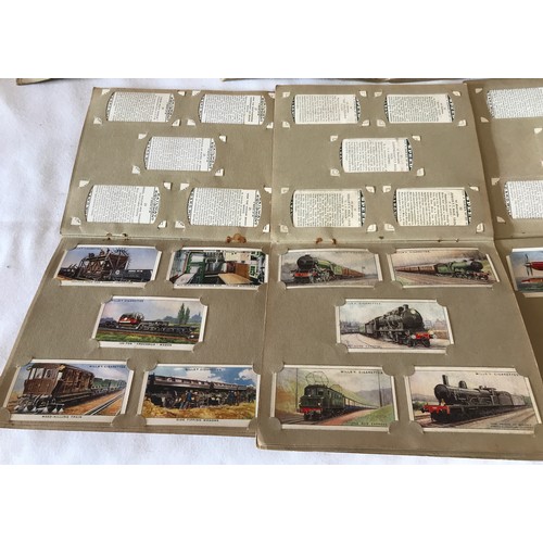 1229 - A large collection of cigarette cards, full sets in 11 Wills and 4 Park Drive card albums to include... 