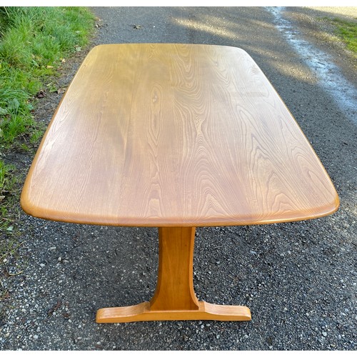 102 - Ercol elm dining table 152 x 84 x 73cm.