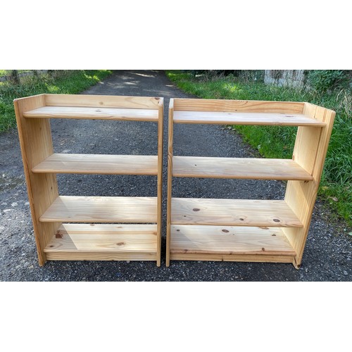 103 - A pair of pine free standing bookshelves 84 x 61 x 28cm.