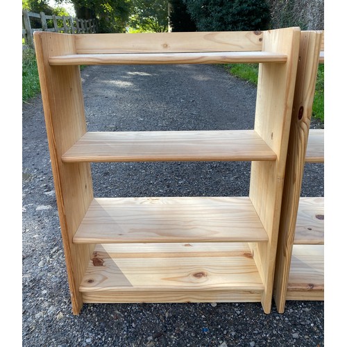 103 - A pair of pine free standing bookshelves 84 x 61 x 28cm.