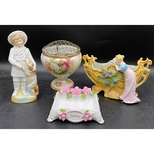 238 - Continental ceramics to include rose bowl, twin handled planter, figure of boy with dog and a Yardle... 