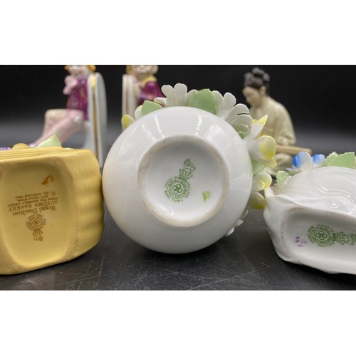 245 - English and Continental porcelain to include a pair of book ends, Royal Albert 'Mrs Tiggy Winkle Tak... 