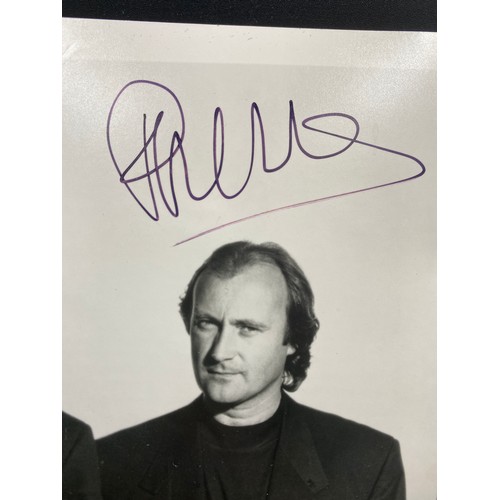 1231 - GENESIS: Signed 8 x 10 photograph by all three members of the English rock band individually, compri... 