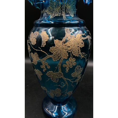 415 - Two Venetian blue glass vases with gilt overlay, 34cm high