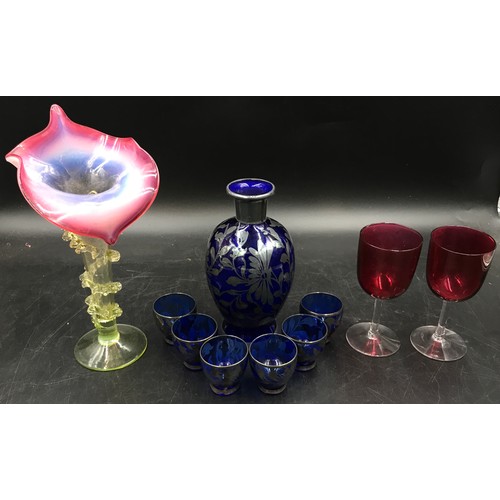 416 - Ten pieces of various glass comprising a pair of cranberry wine glasses, a coloured glass trumpet ta... 