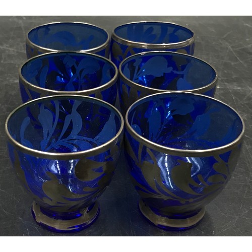 416 - Ten pieces of various glass comprising a pair of cranberry wine glasses, a coloured glass trumpet ta... 