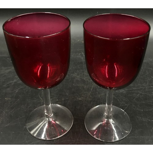 416 - Ten pieces of various glass comprising a pair of cranberry wine glasses, a coloured glass trumpet ta... 