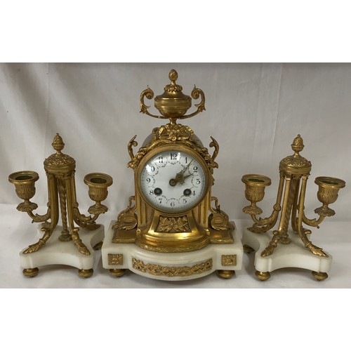 1171 - A French style white marble and gilt metal clock garniture with white enamel face,
30cms high.