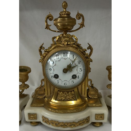 1171 - A French style white marble and gilt metal clock garniture with white enamel face,
30cms high.