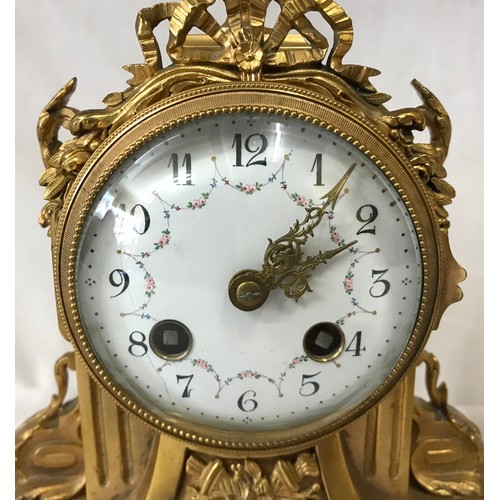 1171 - A French style white marble and gilt metal clock garniture with white enamel face,
30cms high.