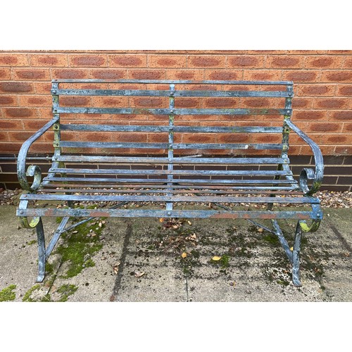 230 - A heavy wrought iron bench.