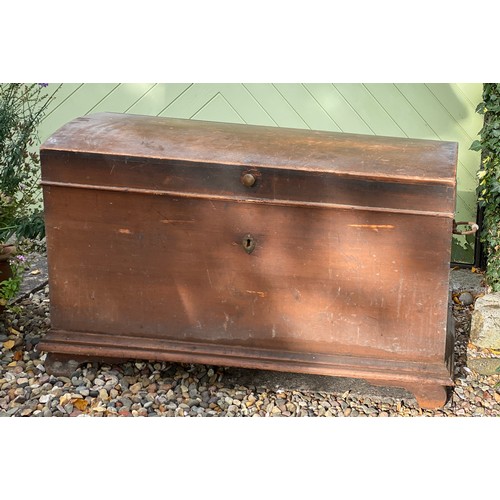 124 - A pine blanket box with interior candle box. Domed top and metal handles. 98.5 w x 55 d x 59cm h.