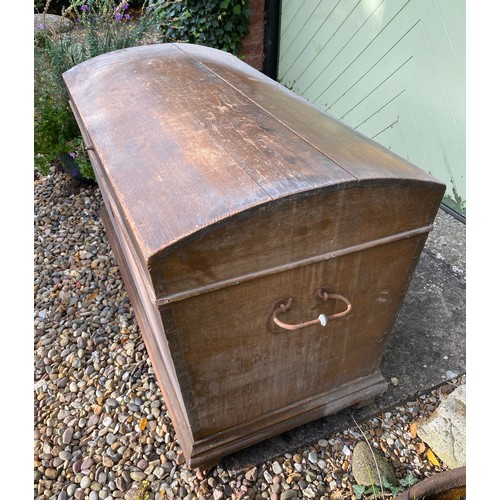 124 - A pine blanket box with interior candle box. Domed top and metal handles. 98.5 w x 55 d x 59cm h.