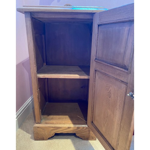 125 - A pine pot cupboard, bevel edged mirror to door front with shelf to interior. 75 h x 41 w x 33cm.