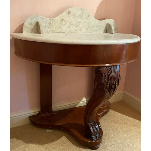 134 - A marble topped demi-lune mahogany washstand. 70 cm h to surface, 88cm to top x 89cm w x 46cm d.