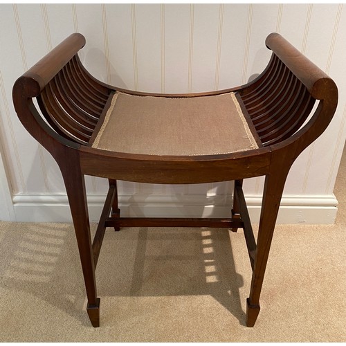 137 - An Edwardian mahogany stool on square tapered legs and upholstered seat. 55 w x height to seat 48cm.