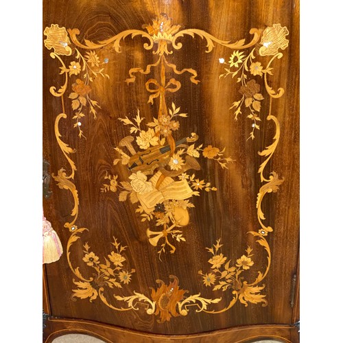 149 - A mahogany marquetry inlaid music cabinet with metal mounts. 96 h x 56 w x 40cm d.