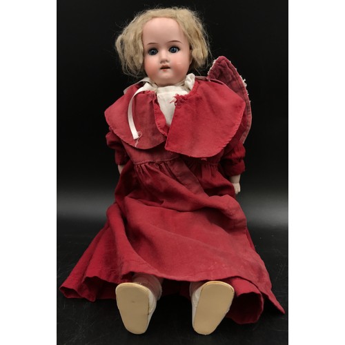 816 - Armand Marseille doll 48cm h with leather body and bisque forearms, hands and lower legs, blue inset... 