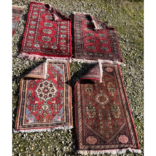 1214 - Four rugs to include a genuine Pakistan hand knotted wool pile. 98 x 59cm, 78 x 52cm, 97 x 62cm d, 8... 