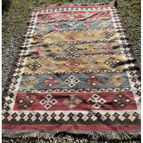 1216 - A Kilim style rug. 236 x 178.