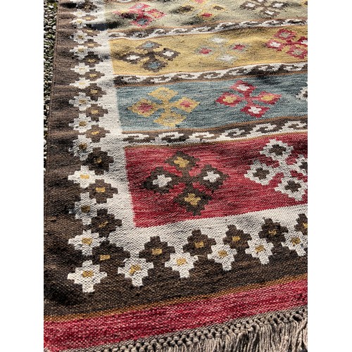 1216 - A Kilim style rug. 236 x 178.