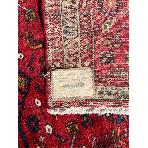 1218 - A selection of 4 rugs, largest rug including tassels 145 x 106cm.