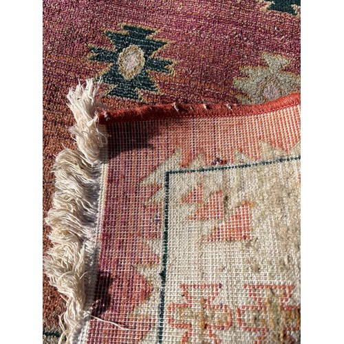 1218 - A selection of 4 rugs, largest rug including tassels 145 x 106cm.