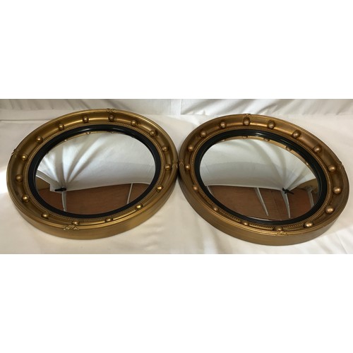 1130 - Pair of vintage Convex wall mirrors 47cm diameter with black inner trim.