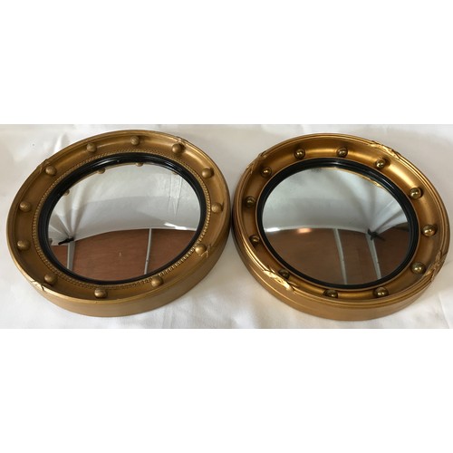 1131 - Pair of Convex wall mirrors 34cm diameter with black inner trim.