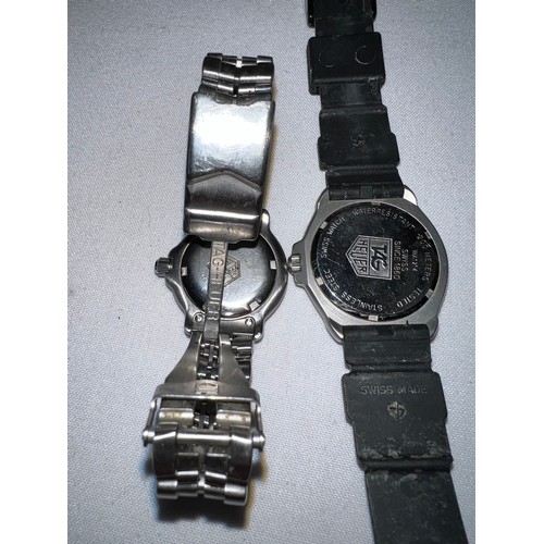 963 - Two Tag Heuer Professional watches, one with black dial.