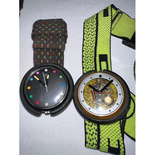 964 - A collection of Swatch watches to include 3 Swatch Pop.