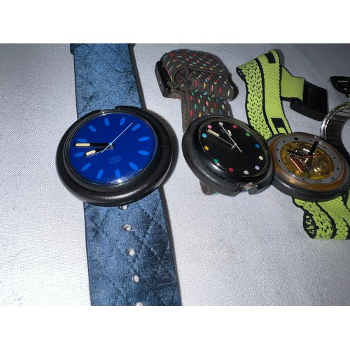 964 - A collection of Swatch watches to include 3 Swatch Pop.