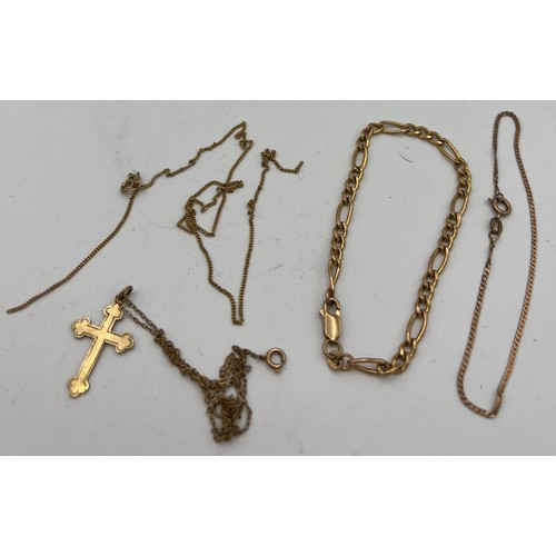 615 - Nine carat gold to include two chain bracelets, crucifix on chain and a broken fine chain necklace. ... 