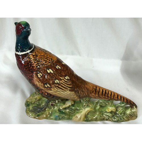 1012 - Two Border Fine Arts models Red Grouse A1279, Partridge A0660 along with a Beswick Pheasant 1225.