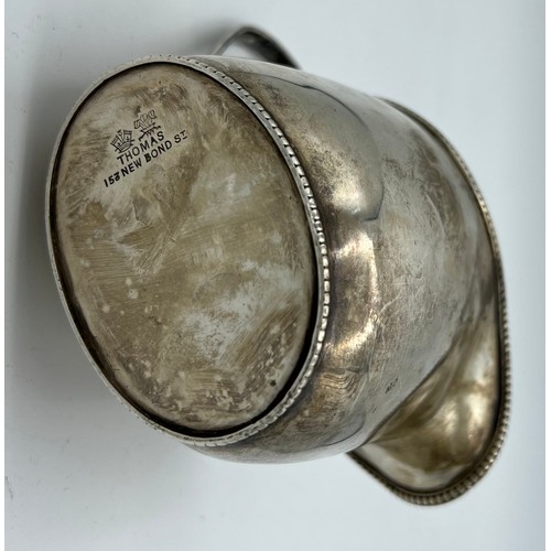 768 - Silver cream jug, London 1886, maker FB Thomas and Co New Bond Street London. Weight 153gm.