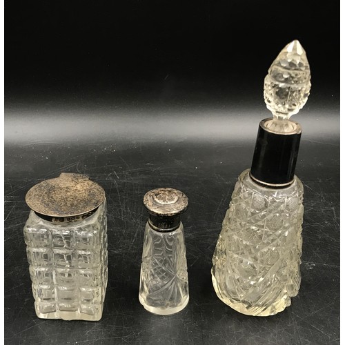 770 - Three silver rimmed perfume bottles and three glass perfume bottles, 2 matching. One Birmingham 1919... 