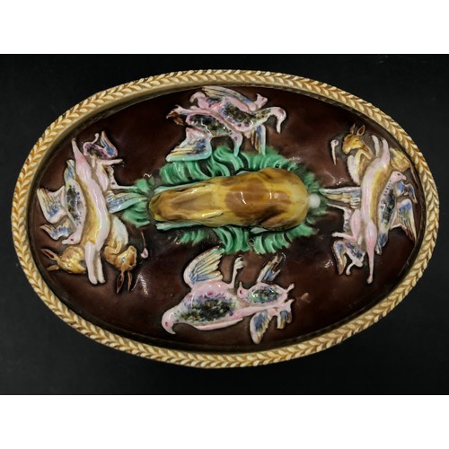 267 - A Wedgwood Majolica Game Pie Dish, with liner, oval, the cover with rabbit finial and moulded in rel... 